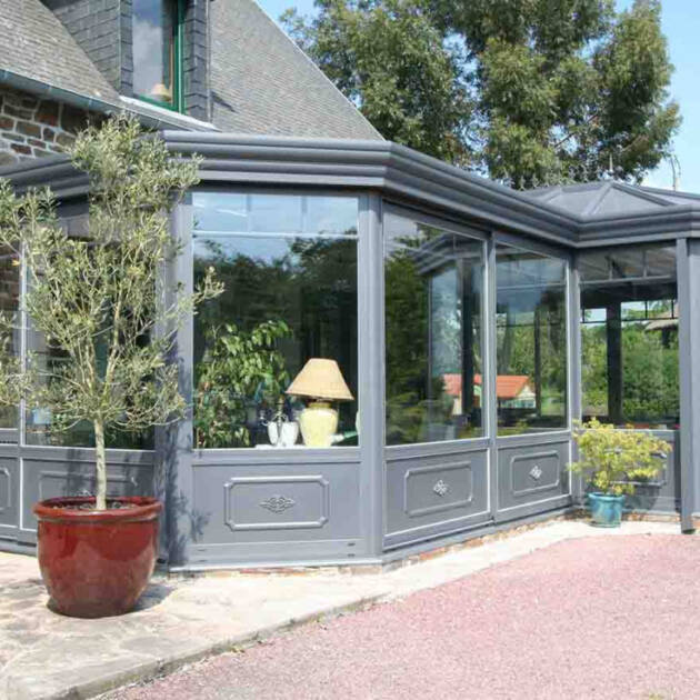Véranda victorienne à toiture isolée